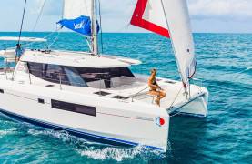 Guest sitting on Sunsail yacht while cruising