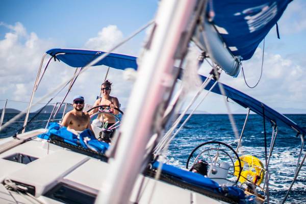 Sunsail customer taking the helm